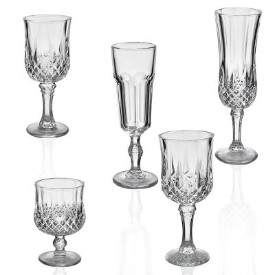 China Drop Resistant Wholesale European Style Embossed Transparent Wine Glass Water Goblet en venta