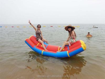 China Inflatable fish inflatable seasaw fly boat amusement park equipment banana water-air sofa for sale