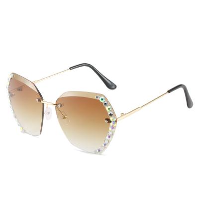 China Fashion Sunglasses 2022 New Trend Rimless Sunglasses Diamond Studded Multilateral Sunglasses Women Personalized Gradient Lenses for sale