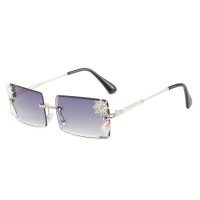 China 2022 rimless the new personality of Diamond Sunglasses European And American personality small square lenses shape Central Institute of Statistics style sunglasses for sale