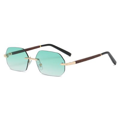 China European and American rimless fashion sunglasses multilateral women gradually changing color sunglasses wood grain reprocessing for sale