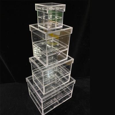 China Eco-friendly bespoke set 4pcs crystal clear acrylic flower gift box rose flower display riser for boutique store for sale