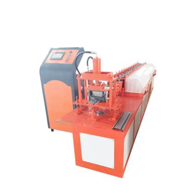 China Building Material Stores Good Quality Shitong Brand Roller Shutter Door Roll Forming Making Machine for sale