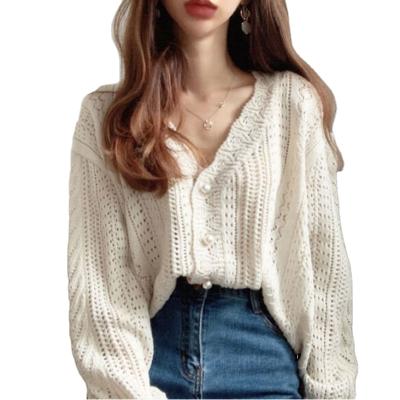 China Anti-wrinkle winter sweater hollowed-out blouse loose knitted top lady sweaters for sale