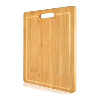 China Extra Large Disposable Organic Bamboo Cutting Board Bamboo Chopper with Juice Grooves for sale