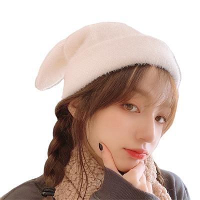 China Newly Popular Cute Character Rabbit Ears Beret Warm Hat And Fleece Hats In Stock for sale