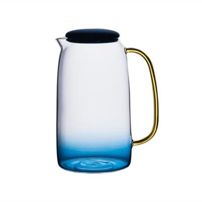 China Viable Glass Pyrex Teapot Glass Handle Blue Silicone Cover Warmer Glass Teapot Set for sale