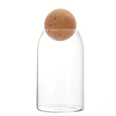 China Kitchen Tea Glass Bottle Round Ball Stocked Heat Resistant Lid Sealed Pot Creative Coffee Bean Storage Cork Storage Jar for sale