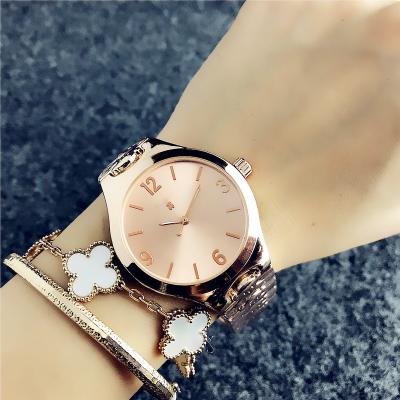 China Non-specific fashion design studded wristwatches designer brand business wristwatch men watch pour femmel alloy quartz watch for sale