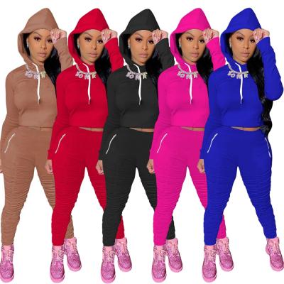 China Two-piece suit anti-pilling autumn winter sale solid color multi-fold hoodie sports suit pants warm zipper pocket for sale