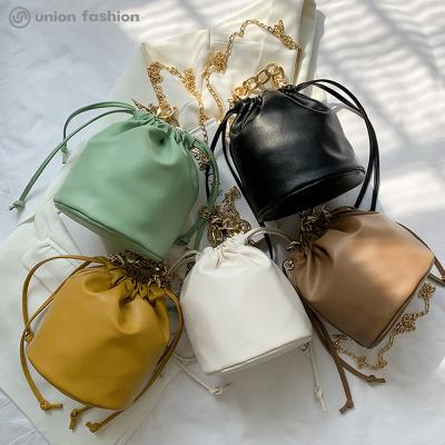 China Fashion Summer White Leather Drawstring PU Bucket Cross - Body Bag Handbag for sale