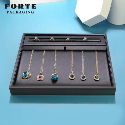 China FORTE Eco-Friendly Fall Resistant Nordic Leather Jewelry Tray Black Jewelry Display for sale