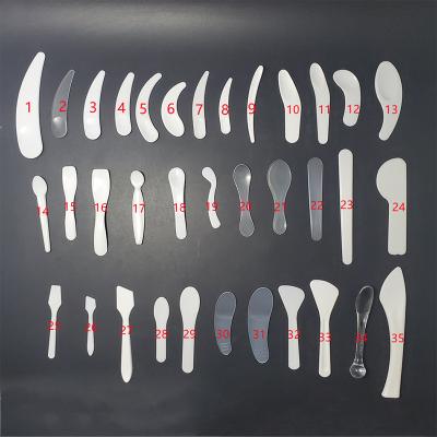 China Various Eye Cream Massage Scoop Acrylic Beauty Cream Spatula Beauty Care PP Makeup Spoon Plastic Spoon for sale