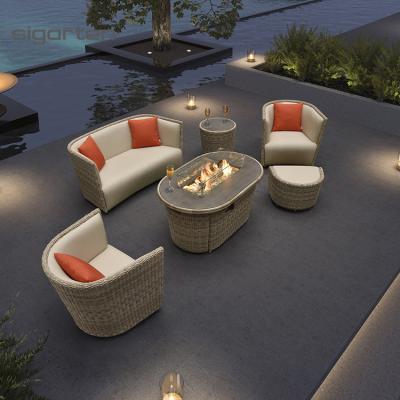 China Patio Garden Rattan Sofa Outdoor Fireplace Furniture Gas Fire Stocked Pit Table for sale