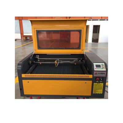 China Laser CUTTING China Factory Supply 6090 CNC CO2 Engraving Cutting Laser Cutter Machine 80w 100w for sale