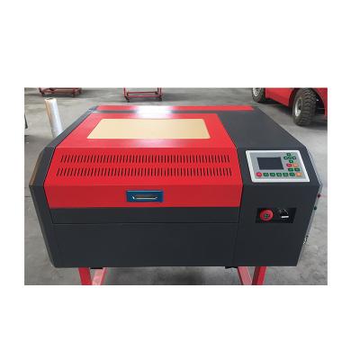 China Laser Engraving 40w laser cutting engraving machine mini laser engraving machine /co2 laser cutting machine price for sale