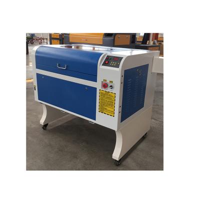 China Laser Engraving 50W CO2 Laser Cutting Engraving Machine For Nonmetal Wood Paper Leather Plastic Stone Glass for sale