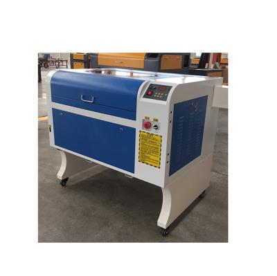 China Laser Engraving Good Price 50W Laser Cutting Machine And Laser Engraving Machine Working Size 40*60cm for sale