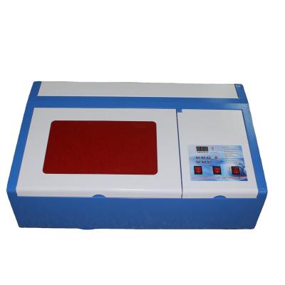 China Laser Engraving Portable Mini Laser Engraving Cutting Machine 3020 For Fiber Wood Glass Leather for sale