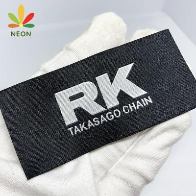 China Low Minimum Washable Sewing On Letters Logo Washable Tags Machine Woven Customized Labels For Poly Shirts for sale