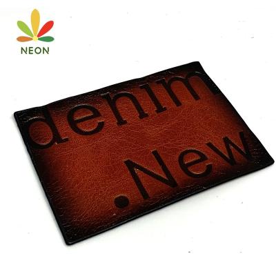 China Custom Private Name 3D Factory Logo Genuine Leather Jeans Labels For Hats for sale