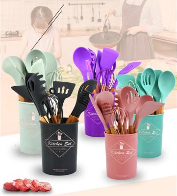 China Viable China manufacturers non stick cookware kitchen accessories household cooking wooden stand silicone nylon kitchen utensils set for sale