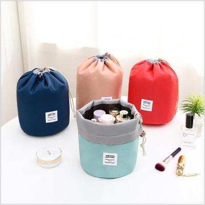 China Travel Waterproof Shockproof Multifunctional Dustproof Shockproof Belt Storage Bag Cylinder Wash Bag Storage Drawstring Cosmetic Pouch for sale