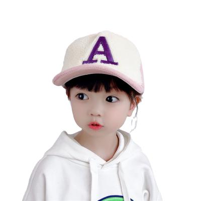 China New character autumn and winter children's hat keep warm peaked baseball hats baby hat lambswool fur ball embroidery boys and girls for sale