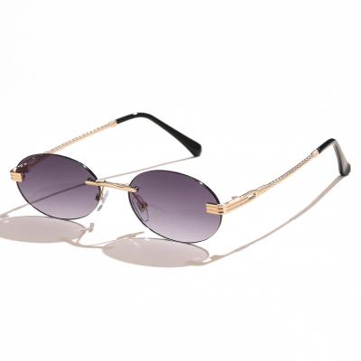 China Fashion Sunglasses UNOC Small Personality Frame Oval Shape Sun Glasses 2021 Women And Men Rimless Luxary Sunglasses for sale