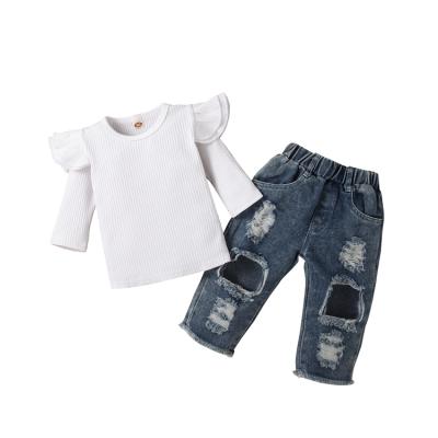 China Custom Made Casual Little Girls Clothes Outfits White Ribbed Hole Top Denim Pants 2pcs Toddler Babies Clothing Sets for sale