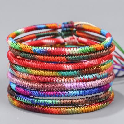 China Ethnic Handmade Purple Adjustable Rope Bracelet Love Luck Knot Tibetan Buddhist Bracelet For Women Men for sale