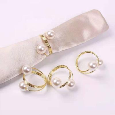 China Stocked Gold And Silver Cheap Sale Personalized Pearl Napkin Ring For Wedding Dinning for sale