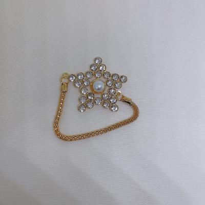 China Stocked Cheap Sale Personalized Kc Gold Pearl STAR Napkin Ring For Wedding Dinning for sale