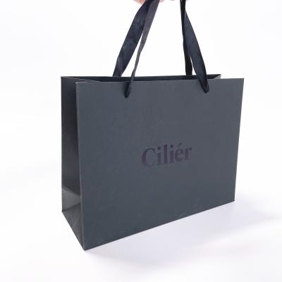 China Luxury Custom Logo Printing Disposable Package Paper Bag Disposable Recycled Black Paper Shopping Bag for sale