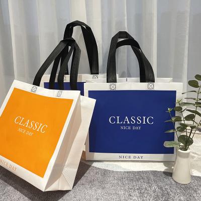 China Customized Promotional Cheap Strong Grocery Handled Logo Tote Non Woven Shopping Bag Eco Friendly Green Reusable Large For Supermarket for sale