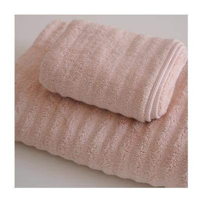 China Wholesale Customized Long-staple QUICK DRY Cotton Logo Wave Exfoliating Bath Towel Set for sale