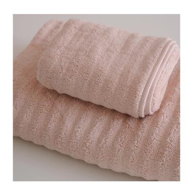 China QUICK DRY Household Water Wave Cotton Single Grain Bath Towel Set Handuk for sale