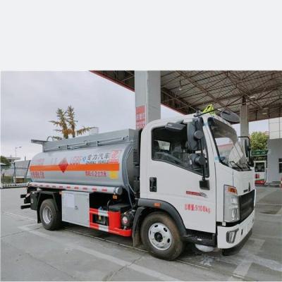 China Transport SINOTRUK HOWO 6000 Liter Gasoline Oil Fuel Tanker Truck Oil Distributor Truck For Sale To Ethiopia for sale