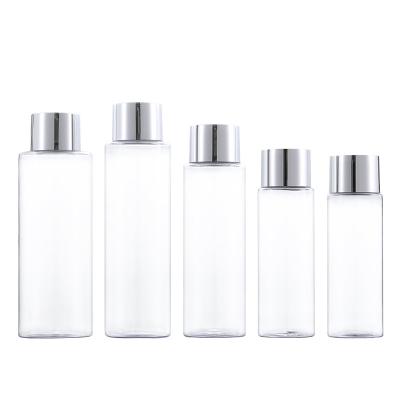 China Custom Logo 100 Cream Bottle 120 150 200 250ML Luxury Clear Flat Shoulder PET Bottle With Silver Cap For Small Toner Makeup Water Containers for sale