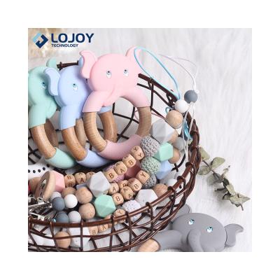 China Soft Toy Drop Shipping Baby Toys Wooden Ring Hand Teething Rattles Wooden Chew Play Gym Montessori Stroller Silicone Baby Teether Beech for sale