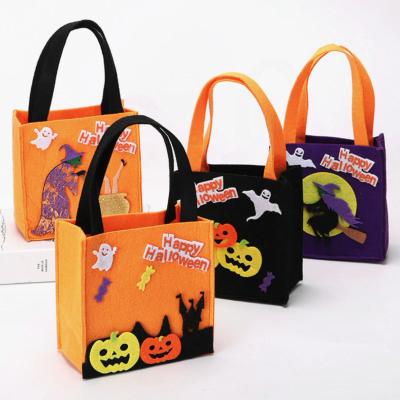 China 2022 Halloween Candy Bag Halloween Trick or Treat Bags Cartoon Image Felted Basket Gift Packaging Cute Candy Bags for sale