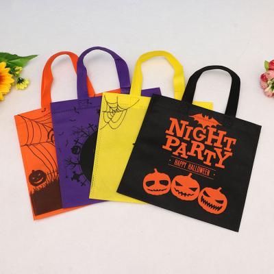 China Who respects the environment; Recyclable; Wholesale Reusable Halloween Ghost Festival Printing Nonwoven Gift Tote Candy Bags Coated Print Pumpkin Bags for sale