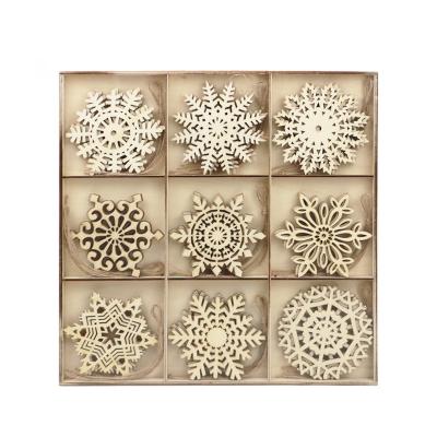 China Wood (Plywood) in Stock Promotional White Wooden Snowflake Christmas Tree Ornaments for sale