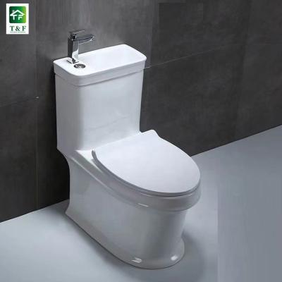 China Modern Ceramic Bathroom Bowl Double-Flow Siphonic Toiletries Soft Cover Seat Wc One Piece Public Toilet With Sink for sale