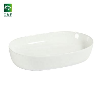 China Premium Ceramic Oval Shape Bathroom Vessel Art Hand Wash Basin Sink Vanity High Temperature Ceramic Above Countertop for sale