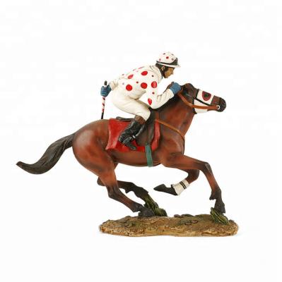 China Beautiful Modern Resin Figure White Dressed Brown Horse Rider Rider Resin Figure Decoration for sale