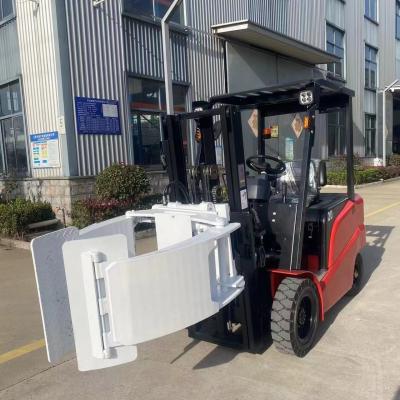 Chine 3 tonnes élévateur électrique d'entrepôt 4 roues actionnées Power Stacker chariot élévateur à fourche avec pinces à vendre