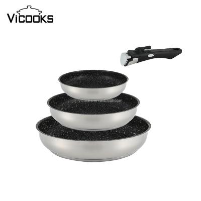 China General Use For Gas And Induction Cooker 4 Egg Cartoon Frying Pan Stainless Steel Double Side Pan With Removable Handle for sale