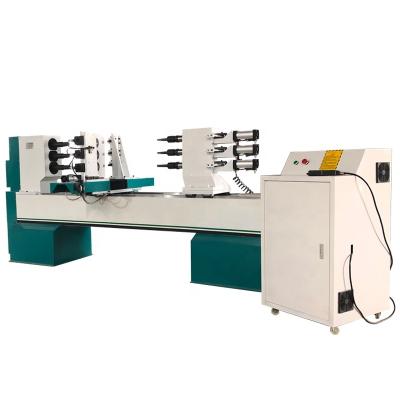 China CNC Wood Lathe Gyroscopic Automatic Wood Handle Lathe Machine For Wood Turning for sale