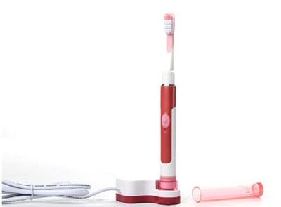 China Chargeable Sonic Vibrating Pink Travel Electric Toothbrush with Cap for sale